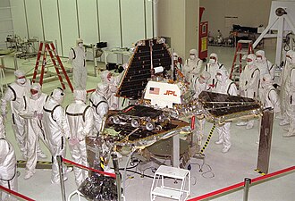 Pathfinder and Sojourner at JPL in October 1996, being 'folded' into its launch position.