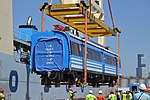 Roca Line cars being unloaded at the Port of Buenos Aires