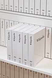 Several print volumes of Wikipedia. Volume information on the spine shows they are numbers 203 through 207, and range from ARS to ARY.