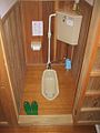 A Japanese temple hotel, with squat toilet and toilet slippers