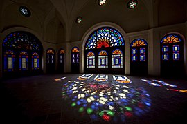 Iranian stained glass designs inside the Tabātabāei House.