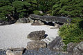 A bridge at Tokushima castle made of two stones resting on a third stone (1592)