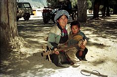 Mother and son busking in Lhasa, Tibet, 1993