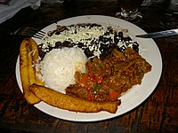 Pabellón criollo (below right), with beans, fried plantain and rice