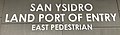 Photo of the sign on the East Pedestrian Facility at the San Ysidro Land Port of Entry.