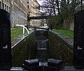 View of Lock 1E and westward behind the University of Huddersfield buildings