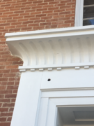A bullet hole in the Lyceum's woodwork