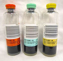 Three clear bottles with differently coloured caps and labels.