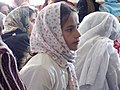 An Afghan girl wears an Islamic style scarf at the International Women's Day celebration in Pajshir in 2008.
