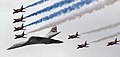 Image 50Concorde (and the Red Arrows with their trail of red, white and blue smoke) mark the Queen's Golden Jubilee. With its slender delta wings Concorde won the public vote for best British design. (from Culture of the United Kingdom)