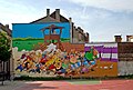 Verschiedene Figuren aus den Asterix-Comics auf einem Wandgemälde in Brüssel