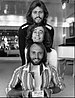 Bee Gees in 1978 (top to bottom) Barry, Robin, and Maurice Gibb