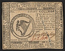 A 1776 eight-dollar banknote featuring the "United Colonies" name with the inscription ""EIGHT DOLLARS. THIS Bill entitles the Bearer to receive EIGHT Spanish milled DOLLARS, or the Value thereof in Gold or Silver, according to a Resolution of CONGRESS, passed at Philadelphia February 17, 1776." ; Within border cuts: "Continental Currency" and "The United Colonies". ; Within circle: "MAJORA. MINORIBUS. CONSONANT". ; Verso: "EIGHT DOLLARS. PHILADELPHIA: PRINTED BY HALL & SELLERS. 1776."