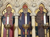 Detail of reredos, L to R, King Saint Edward the Confessor (last king of the English House of Wessex), Saint Peter the Apostle, Saint Francis of Assisi