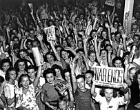 Citizens and workers of Oak Ridge, Tennessee celebrate V-J Day on August 14, 1945[a]