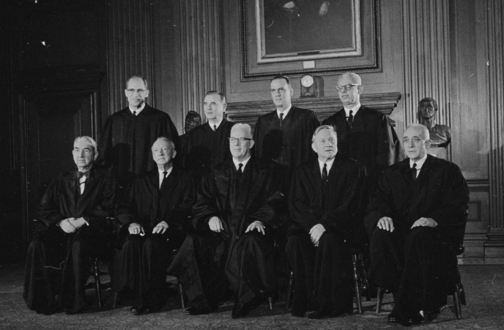 The Supreme Court seen pictured on November 19, 1962. White (top left) was the Court's second most junior justice, after Arthur Goldberg, having arrived on the bench in April.
