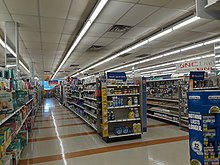 Two aisles of a Rite Aid drugstore