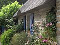 Image 21Roses, clematis, a thatched roof: a cottage garden in Brittany (from Garden design)