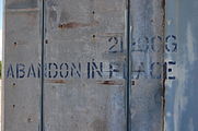 "Abandon in place", which means to abandon it "as is", with no maintenance. Most of the historical launch sites at Cape Canaveral are categorized in this manner.
