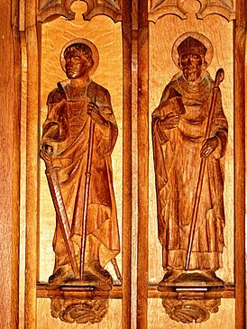 Св. Альбан (слева) и Седд (справа). Резьба по дереву в Храме Всех Святых в Грэйт-Бракстеде[англ.], Эссекс, автор Натаниэль Хитч[англ.] (1845—1938)