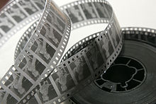 A reel of 35 mm black & white movie film negative stock