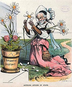 John Sherman, Secretary of State, dressed as an old woman with a purse labeled "Sec. Sherman", plucking the petals off daisies labeled "Hawaii, Cuba, [and] Bering Sea" picked from a flowerpot labeled "Diplomatic Questions"