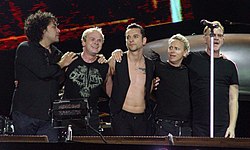 Depeche Mode in concert, 2006. Other musicians Peter Gordeno (far left) and Christian Eigner (centre-left), with original members Dave Gahan (centre), Martin Gore (centre-right) and Andy Fletcher (far right).