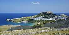 General view of the village of Lindos, with the acropolis and beaches, island of Rhodes, Greece.