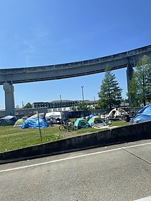 A homeless camp under a highway bridge in New Orleans, LA