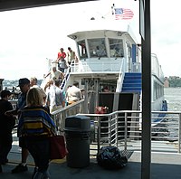 A boat boarding at the terminal