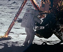 Neil Armstrong next to the Apollo 11
