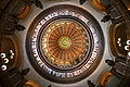 Image 31The dome of the Illinois State Capitol. Designed by architects Cochrane and Garnsey, the dome's interior features a plaster frieze painted to resemble bronze and illustrating scenes from Illinois history. Stained glass windows, including a stained glass replica of the State Seal, appear in the oculus. Ground was first broken for the new capitol on March 11, 1869, and it was completed twenty years later. Photo credit: Daniel Schwen (from Portal:Illinois/Selected picture)