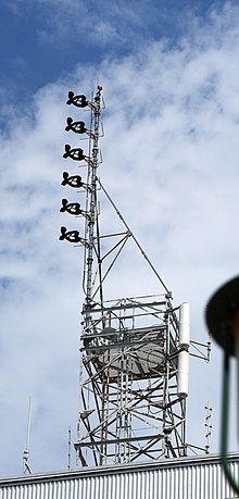 A six-bay FM antenna atop a high-rise building