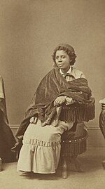 Edmonia Lewis was of Mississauga Ojibwe, African-American and Haitian descent.[65]