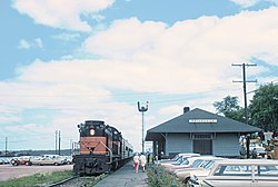 A Milwaukee Road passenger train at Rothschild in 1967