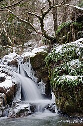 The Puits d'Enfer waterfall in the snow