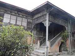 View of the stairs and side of the house