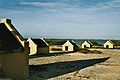 Image 4The forced African migrants brought to the Caribbean lived in inhumane conditions. Above are examples of slave huts in Dutch Bonaire. About 5 feet tall and 6 feet wide, between 2 and 3 slaves slept in these after working in nearby salt mines. (from History of the Caribbean)