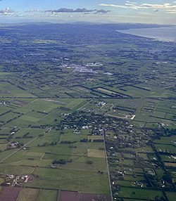 Ohoka looking north, with Rangiora in the distance