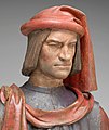 Lorenzo de' Medici after Verrocchio, later than 1478, wearing a rather simple chaperon. The larger styles are now outdated, plus he is projecting a political message as Pater Patriae. See link below for post-restoration photos.