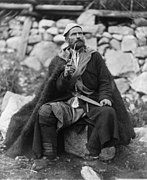 Old peasant with dagger and long smoking pipe, Mestia, Svanetia, Georgia (Republic)