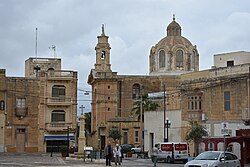 View from the Nadur Square showing the Church of the Sacred Heart of Jesus (a smaller church close to the Nadur Parish Church)