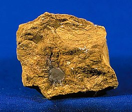 Limonite is a form of yellowish iron ore. A clay of limonite rich in iron oxide is the source of raw sienna and burnt sienna.