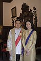Prime Minister Abhisit Vejjajiva wears the First-Class Ministerial Gown (ครุยเสนามาตย์ชั้นเอก; Khrui Senamat Chan Ek). This golden brocaded gown was part of the traditional attire of the Chief Minister of the Civil Service in ancient times and is now still in ceremonial use.