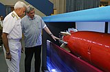 Admiral Sunil Lanba and Manohar Parrikar taking a close look at the Varunastra, during its handing off ceremony to the Indian Navy