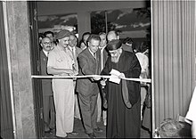 Rabbi Uziel at the opening of an exhibition, with General Yigael Yadin
