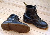 Boots like Timberlands and Dr. Martens became popular. Hiking, motorcyclist and safety boots were all part of the general trend towards grunge fashion in footwear