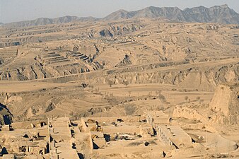 A landscape of loess soil in Datong, Shanxi, China. Loess originated as windblown silt. It is very fertile but erodes easily