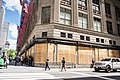 Private security guards, barbed wire fencing, and boarded up windows to prevent looting of department stores in New York City during mass unrest in the United States, 7 June 2020