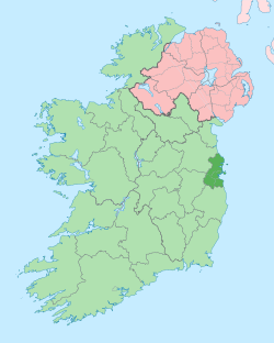 map showing County Dublin as a small area of darker green on the east coast within the lighter green background of the Republic of Ireland, with Northern Ireland in pink
